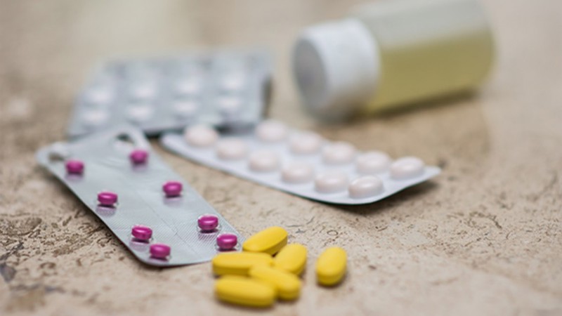 selection of pills and pill bottles