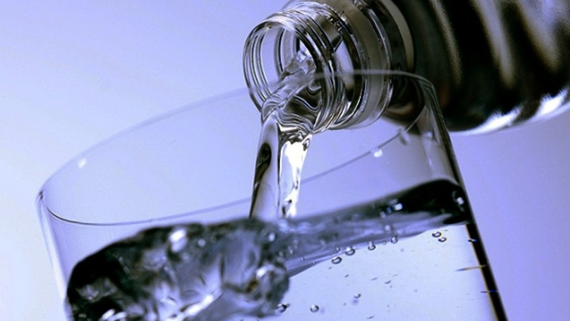 water being poured into a glass
