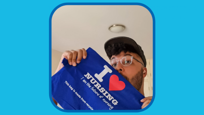 Hakeem with I love nursing bag